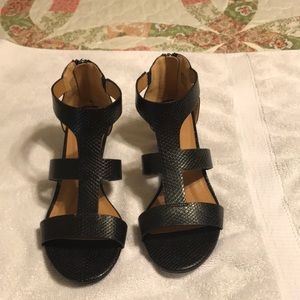 Never worn black shoes, wedge with back zipper size 9m!  Made by New Direction!